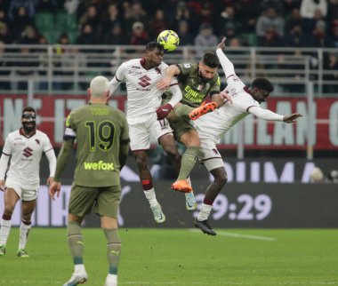 Stephane Singo of Torino FC and Olivier Giroud of AC Milan during the Italian serie A, football match between Ac Milan and Torino Fc on 10 February 2023 at San Siro Stadium, Milan, Italy. Photo Ndrerim Kaceli - Credit: Nderim Kaceli/LiveMedi