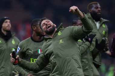 Olivier Giroud of AC Milan celebrates the victory at the end of the match during Serie A 2022/23 football match between AC Milan and Torino FC at San Siro Stadium, Milan, Italy on February 10, 2023 - Credit: Fabrizio Carabelli/LiveMedi
