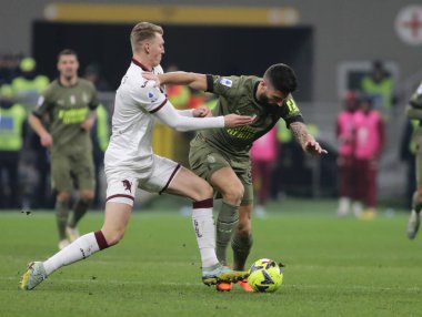 Perr Schuurs of Torino FC and Olivier Giroud of AC Milan during the Italian serie A, football match between Ac Milan and Torino Fc on 10 February 2023 at San Siro Stadium, Milan, Italy. Photo Ndrerim Kaceli - Credit: Nderim Kaceli/LiveMedi