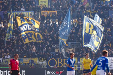 Fans of Modena during Italian soccer Serie B match Brescia Calcio vs Modena FC at the Mario Rigamonti stadium in Brescia, Italy, February 11, 2023 - Credit: Luca Dilibert