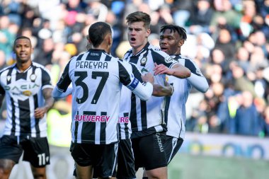 Udinese's Jaka Bijol celebrates after scoring a goal with teammates during italian soccer Serie A match Udinese Calcio vs US Sassuolo at the Friuli - Dacia Arena stadium in Udine, Italy, February 12, 2023 - Credit: Ettore Griffon