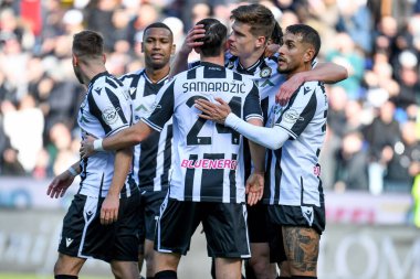 Udinese's Jaka Bijol celebrates after scoring a goal with teammates during italian soccer Serie A match Udinese Calcio vs US Sassuolo at the Friuli - Dacia Arena stadium in Udine, Italy, February 12, 2023 - Credit: Ettore Griffon