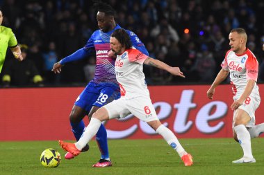 Mario Rui of SSC Napoli  competes for the ball with Soualhio Meitr of US Cremonese  during the Serie A match between SSC Napoli v Cremonese SC at Diego Armando Maradona  Stadium  - Credit: Agostino Gemito/LiveMedi