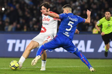 Khvicha Kvaratskhelia of SSC Napoli  competes for the ball with Johan Vasquez of US Cremonese  during the Serie A match between SSC Napoli v Cremonese SC at Diego Armando Maradona  Stadium  - Credit: Agostino Gemito/LiveMedi