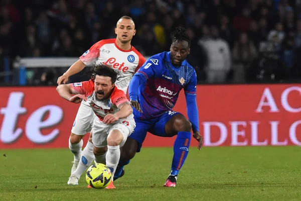 Mario Rui of SSC Napoli  competes for the ball with Soualhio Meitr of US Cremonese  during the Serie A match between SSC Napoli v Cremonese SC at Diego Armando Maradona  Stadium  - Credit: Agostino Gemito/LiveMedi