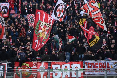 AC Monza supporters at Bologna Stadium during italian soccer Serie A match Bologna FC vs AC Monza at the Renato Dall'Ara stadium in Bologna, Italy, February 12, 2023 - Credit: Gianluca Ricc