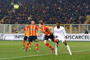 Federico Baschirotto (US Lecce) and Tammy Abraham (AS Roma) during italian soccer Serie A match US Lecce vs AS Roma at the Via Del Mare stadium in Lecce, Italy, February 11, 2023 - Credit: Emmanuele Mastrodonat