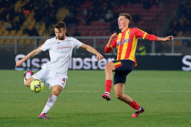 Bryan Cristante (AS Roma) and Kristoffer Askildsen (US Lecce) during italian soccer Serie A match US Lecce vs AS Roma at the Via Del Mare stadium in Lecce, Italy, February 11, 2023 - Credit: Emmanuele Mastrodonat