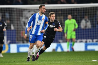 S. Darder (RCD Espanyol) and Ilarramendi (Real Sociedad) during Spanish football La Liga match Espanyol vs Real Sociedad at the RCD Espanyol Stadium in Barcelona, Spain, February 13, 2023 - Credit: Felipe Mondin