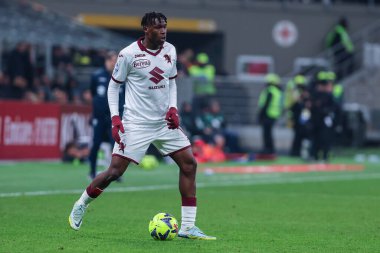 Wilfried Singo of Torino FC in action during Serie A 2022/23 football match between AC Milan and Torino FC at San Siro Stadium, Milan, Italy on February 10, 2023 - Credit: Fabrizio Carabelli/LiveMedi