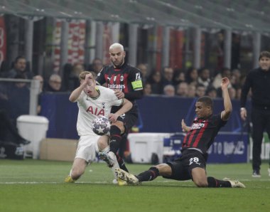 Dejan Kulusevsk of Tottenham Hotspur and Malick Thiaw of AC Milan during the Uefa Champions League, football game between Ac Milan and Tottenham Hotspur on 14 February 2023 at San Siro Stadium, Milan, Italy. Photo Ndrerim Kaceli - Credit: Nderim Kace