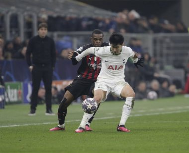 Heung-min Son of Tottenham Hotspur and Pierre Kalulu of AC Milan during the Uefa Champions League, football game between Ac Milan and Tottenham Hotspur on 14 February 2023 at San Siro Stadium, Milan, Italy. Photo Ndrerim Kaceli - Credit: Nderim Kacel