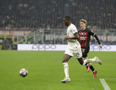 Pape Matar Sarr of Tottenham Hotspur and Alexis Saelemaekers of AC Milan during the Uefa Champions League, football game between Ac Milan and Tottenham Hotspur on 14 February 2023 at San Siro Stadium, Milan, Italy. Photo Ndrerim Kaceli - Credit: Nder