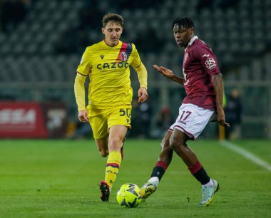 Torino FC 'den Stéphane Singo ve İtalya Serie A' dan Andrea Cambiaso, Torino Fc ile Bologna Fc arasında oynanan futbol maçı, 06 Mart 2023 'te İtalya' nın Torin kenti Torin 'deki Stadio Olimpico Grande Torino' da oynandı. Fotoğraf: Ndrerim Kaceli - Fotoğraf: Nderim Kaceli / L