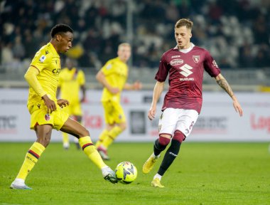 Bologna Fc takımından Jhon Lucumi ve Torino FC takımından Ivan Iliç, İtalya 'nın Torino Fc ve Bologna Fc takımları arasında oynanan futbol maçı sırasında, 06 Mart 2023 tarihinde İtalya' nın Torin kentinde bulunan Stadio Olimpico Grande Torino 'da oynandı. Fotoğraf: Ndrerim Kaceli - Fotoğraf: Nderim Kaceli / LiveMedi