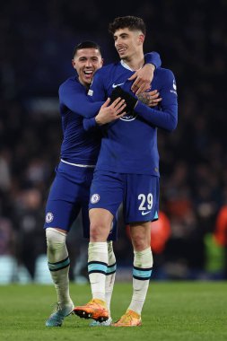 Chelsea FC 'den Kai Havertz ve Chelsea FC' den Enzo Fernandez, UEFA Şampiyonlar Ligi futbol karşılaşmasını Londra 'daki Stamford Köprüsü' nde Chelsea FC ve Borussia Dortmund maçında kazandıktan sonra kutlama yaptılar.