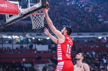 16 KOSTAS PAPANIKOLAOU of Olympiacos Piraeus during the Euroleague, Round 27, match between Olympiacos Piraeus and FC Barcelona at Peace and Friendship Stadium on March 7, 2023, in Athens, Greece. - Credit: Stefanos Kyriazis/LiveMedi clipart