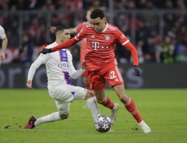 Fc Bayern Münih 'ten Jamal Musiala ve Uefa Şampiyonlar Ligi sırasında Fc Paris Saint-Germain' den Achraf Hakimi, Fc Bayern Münih ile Paris Saint-Germain arasında 8 Mart 2023 'te Allianz Arena, Münih, Almanya Fotoğraf: Ndrerim Kaceli - 