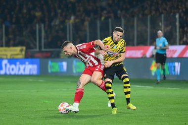 Olympiacos FC 'den 74 ANDREAS NTOI 8 MIJAT GA ile mi yarışıyor? Yunanistan Süper Ligi, Matchday 26 'da AEK FC ve Olympiacos FC arasında 12 Mart 2023' te Atina, Yunanistan 'da oynanan OPAP Arena' da oynanan maç. - Fotoğraf: Stefanos Kyriazis / LiveMedi