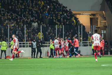 Olympiacos FC 'nin oyuncuları, Yunanistan Süper Ligi, Maç 26, AEK FC ve Olympiacos FC arasında 12 Mart 2023' te Atina, Yunanistan 'da oynanan OPAP Arena' da oynanan karşılaşmayı kutluyorlar. - Fotoğraf: Stefanos Kyriazis / LiveMedi