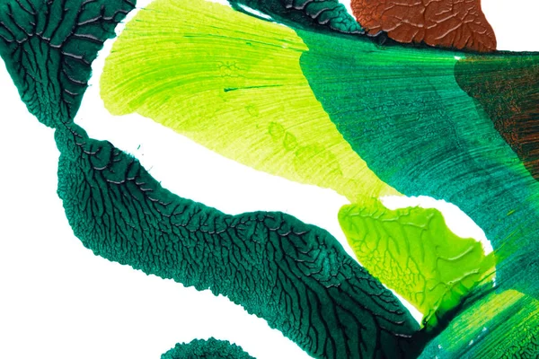 yeşil sarı ve kahverengi soyut akrilik boya renk dokusu beyaz kağıt arkaplan üzerinde rorschach mürekkep lekesi yöntemi kullanılarak