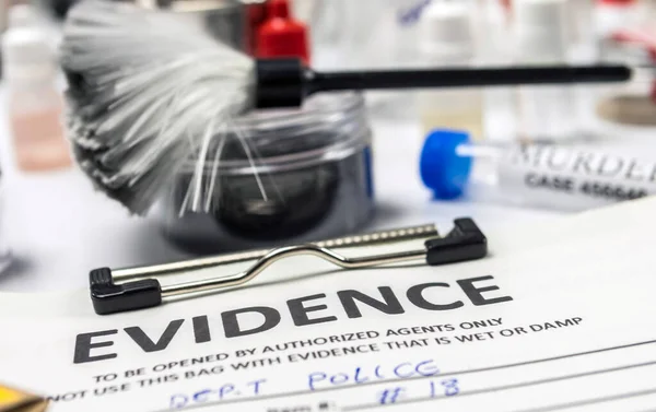 stock image Files and evidence bag in a crime lab, conceptual image