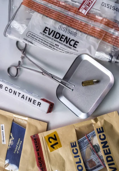 US passport next to bullet in evidence bags in crime lab, concept image