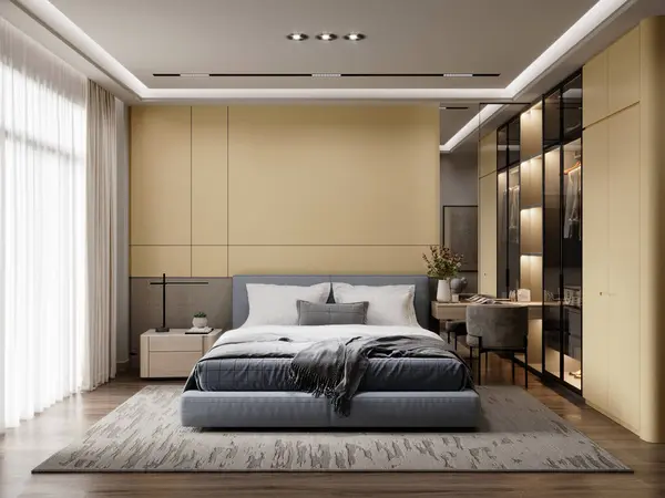 Stock image Modern bedroom with soft yellow accent wall, blue upholstered bed, open wardrobe with glass doors, and a blend of natural textures for a stylish and serene space, 3D rendering, 3D illustration