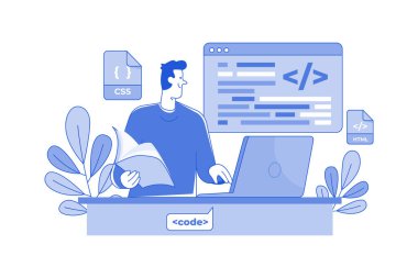 Dizüstü bilgisayarda kod yazan genç bir programcı.