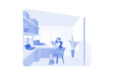 Kadın yazar ofiste bir kitap okuyor.