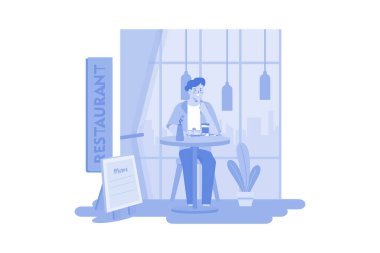 Man Sitting In A Restaurant And Eating Food