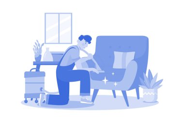 Man Cleaning The Sofa With The Vacuum Cleaner