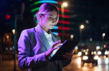 beautiful business woman working outdoor in a modern city.	