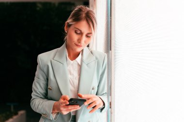  beautiful business woman working outdoor in a modern city.	