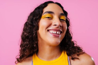 Beautiful young hispanic woman with diastema with colorful and cool style - Confident and interesting female with diverse and unique style, concepts about fashion, individuality and body acceptance