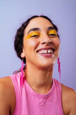 Beautiful young hispanic woman with diastema with colorful and cool style - Confident and interesting female with diverse and unique style, concepts about fashion, individuality and body acceptance