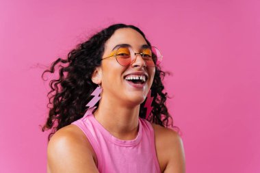 Beautiful young hispanic woman with diastema with colorful and cool style - Confident and interesting female with diverse and unique style, concepts about fashion, individuality and body acceptance