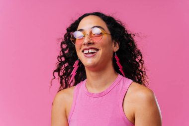 Beautiful young hispanic woman with diastema with colorful and cool style - Confident and interesting female with diverse and unique style, concepts about fashion, individuality and body acceptance