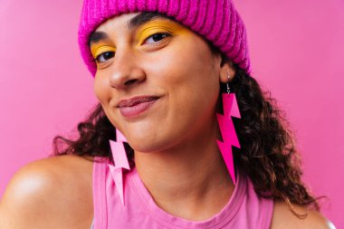 Beautiful young hispanic woman with diastema with colorful and cool style - Confident and interesting female with diverse and unique style, concepts about fashion, individuality and body acceptance