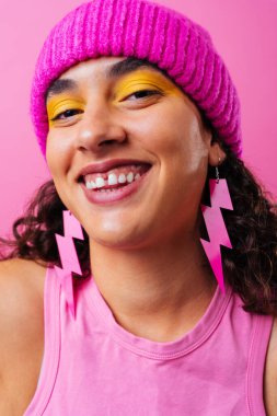 Beautiful young hispanic woman with diastema with colorful and cool style - Confident and interesting female with diverse and unique style, concepts about fashion, individuality and body acceptance