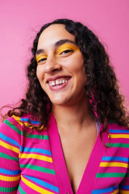 Beautiful young hispanic woman with diastema with colorful and cool style - Confident and interesting female with diverse and unique style, concepts about fashion, individuality and body acceptance