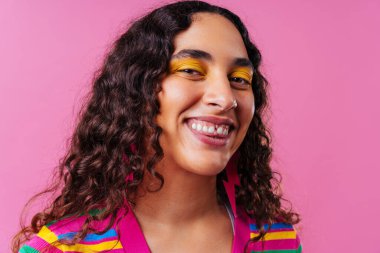 Beautiful young hispanic woman with diastema with colorful and cool style - Confident and interesting female with diverse and unique style, concepts about fashion, individuality and body acceptance