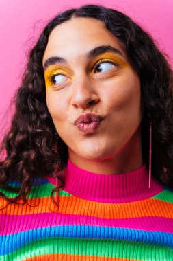 Beautiful young hispanic woman with diastema with colorful and cool style - Confident and interesting female with diverse and unique style, concepts about fashion, individuality and body acceptance