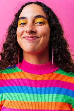 Beautiful young hispanic woman with diastema with colorful and cool style - Confident and interesting female with diverse and unique style, concepts about fashion, individuality and body acceptance