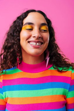 Beautiful young hispanic woman with diastema with colorful and cool style - Confident and interesting female with diverse and unique style, concepts about fashion, individuality and body acceptance