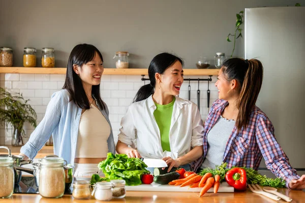 Happy Beautiful Chinese Women Friends Bonding Home Cooking Delicious Meal — Stockfoto