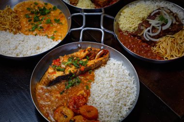 Brezilya usulü kızarmış balık, pirinç ve püre.