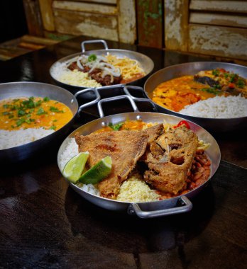 Brezilya usulü kızarmış balık, pirinç ve püre.