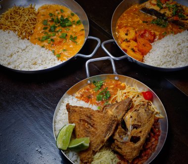 Brezilya usulü kızarmış balık, pirinç ve püre.