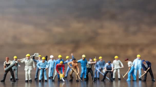 Miniature People Group Worker Team Holding Tool Copy Space Text Stock Video